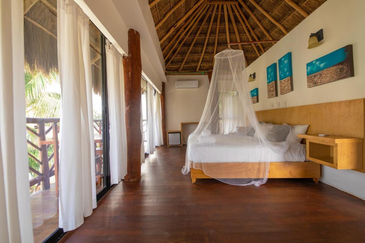 Hotel & Beach Club Ojo De Agua ปัวร์โตโมเรลอส ภายนอก รูปภาพ