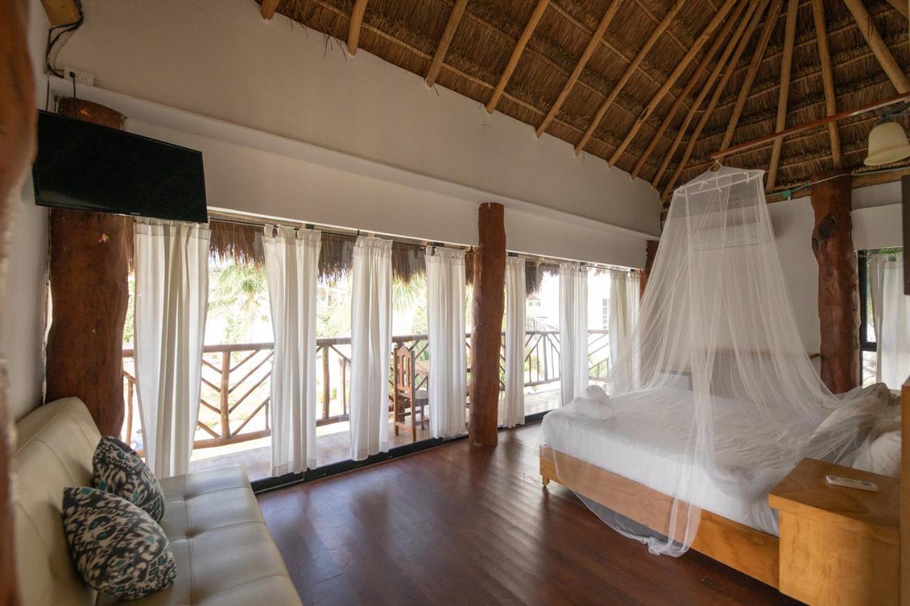 Hotel & Beach Club Ojo De Agua ปัวร์โตโมเรลอส ภายนอก รูปภาพ
