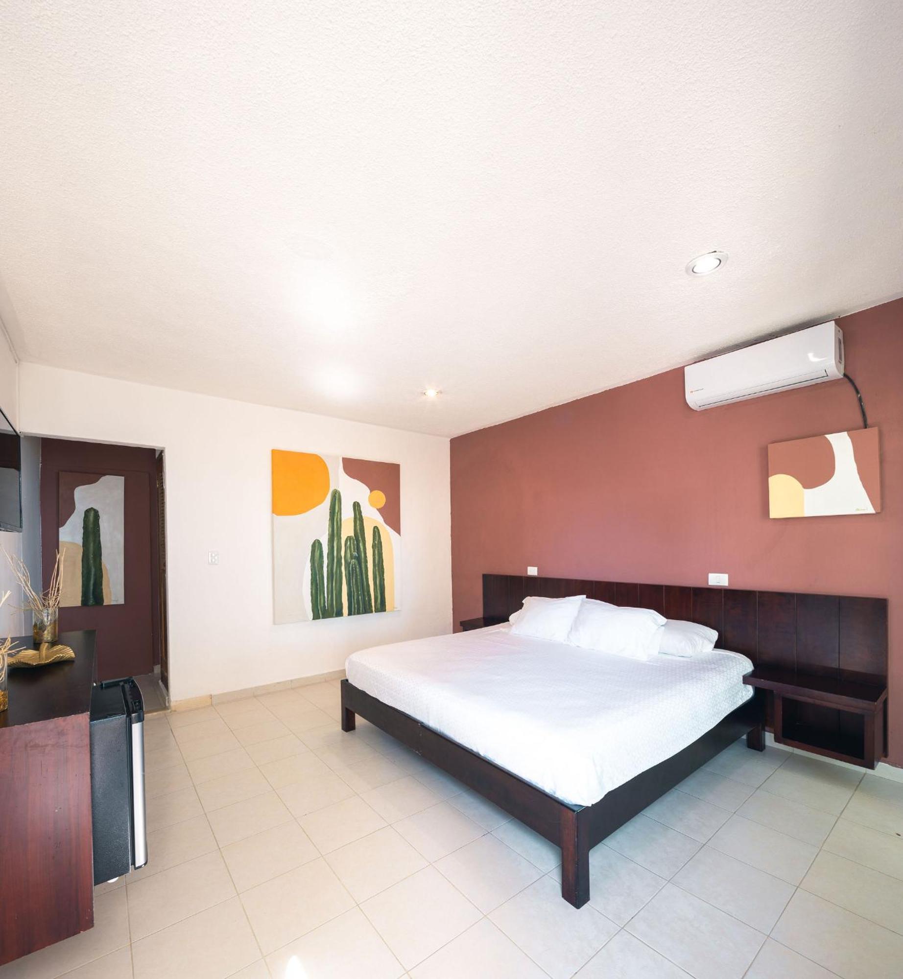 Hotel & Beach Club Ojo De Agua ปัวร์โตโมเรลอส ภายนอก รูปภาพ
